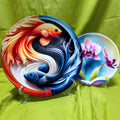 A picture depicting two sizes of ceramic plates that are used for decoration